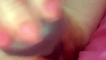 Masturbating big swollen pussy with fat dildo massager