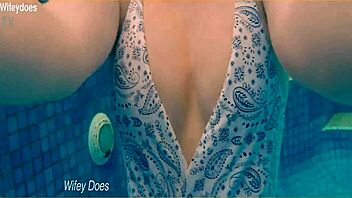preview of hot wife flashing big tits in one-piece swimsuit at hotel pool