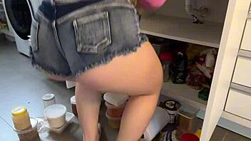 housewife rocking micro jean shorts, wanna see what's hiding underneath them?