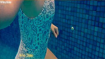preview of hot wife flashing big tits in one-piece swimsuit at hotel pool