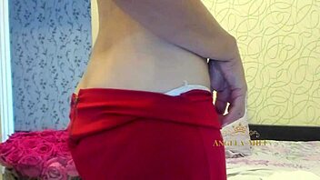 horny mature brunette with hairy pussy strips on couch for fans