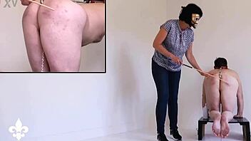 bound slave's harsh caning twists into shocking fisting torment part one