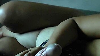 milf sneaks handjob during cartoons while teen teases to cum