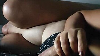 milf sneaks handjob during cartoons while teen teases to cum