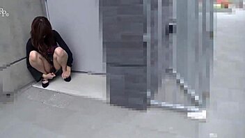 Hitomi Misaki walks with remote vibe buzzing wildly 😈💦