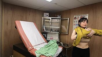 Scarlett Johnson squeezes huge tits in medical fetish play!