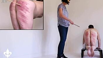 bound slave's harsh caning twists into shocking fisting torment part one