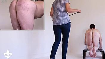 bound slave's harsh caning twists into shocking fisting torment part one