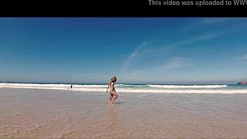 sasha ikeyeva flaunts bikini ass on spanish doninos beach travel show