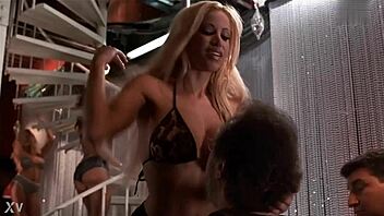 Gina Lynn Teases Big Tits In Steamy Striptease Undress Scene