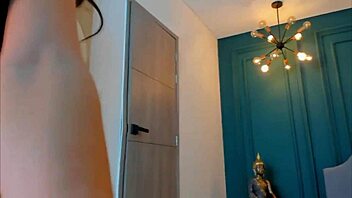 Frida Klein sways enticingly in sleek black lingerie on display