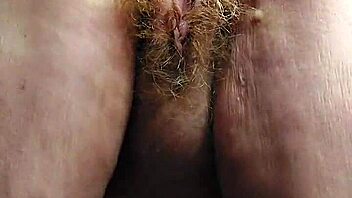 granny shoves cucumber deep in her hairy old beaver