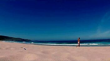 sasha ikeyeva flaunts bikini ass on spanish doninos beach travel show