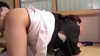 Beautiful Japanese widow toasts in mourning clothes with blowjob