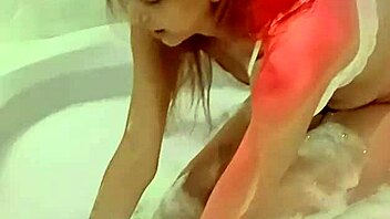 Provocative Dancing Relaxes In Steamy Motel Hydro Tub