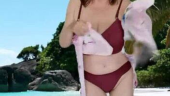 Chubby granny teases huge tits in sexy bikini