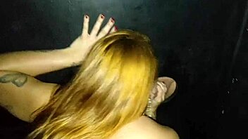 Girlfriend sucks strangers cocks at gloryhole booth