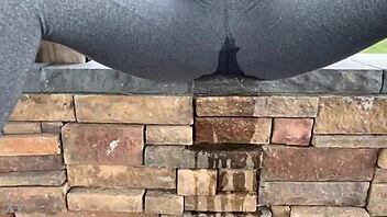 watch this teen soak leggings peeing outdoors solo