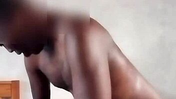 Mature ebony takes rough doggystyle after oily ass massage