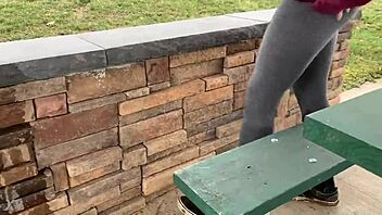watch this teen soak leggings peeing outdoors solo