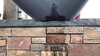 watch this teen soak leggings peeing outdoors solo