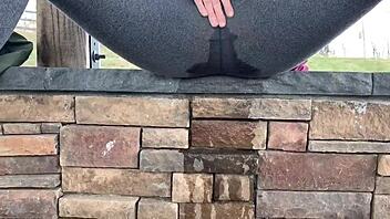 watch this teen soak leggings peeing outdoors solo