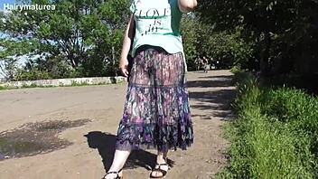 hairy chubby mature flashes pussy thru see-thru dress outdoors