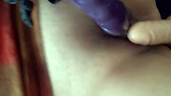 Big pussy lips gape wide as I rub two huge dildos against shaved vagina
