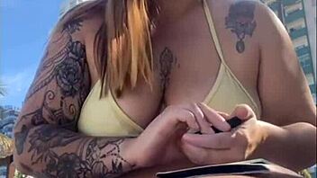 horny african beach babe flashes big pussy for studs