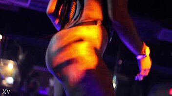 She twerks her ass seductively on the nightclub dance floor.