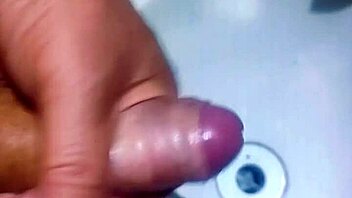 Hidden guy in bathroom sink spurts cum watching exotic Asian slave shower