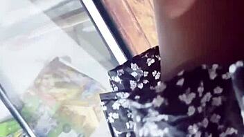 Sneaky upskirt peek under skirt in store