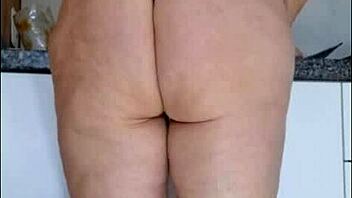 hidden cam catches sexy mature flashing sheer panties kitchen