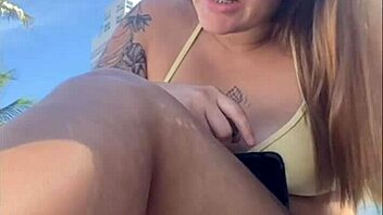 horny african beach babe flashes big pussy for studs