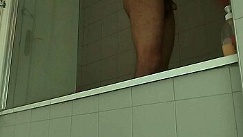 Muscular guy shaves his massive monster cock smooth and sexy