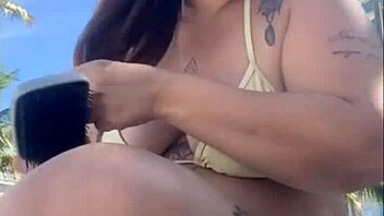 horny african beach babe flashes big pussy for studs