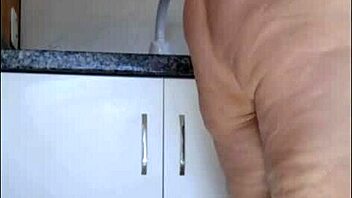 hidden cam catches sexy mature flashing sheer panties kitchen