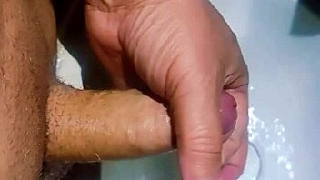 Hidden guy in bathroom sink spurts cum watching exotic Asian slave shower