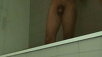 Muscular guy shaves his massive monster cock smooth and sexy