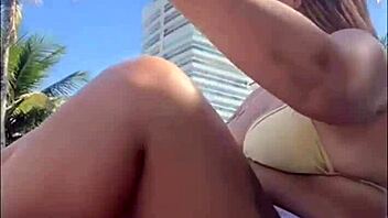 horny african beach babe flashes big pussy for studs