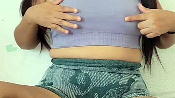 hey cute brunette student teases her big natural tits home from school