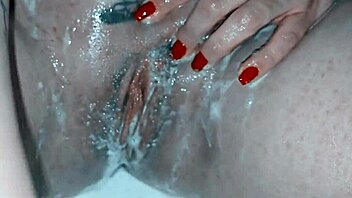 Milf soaps up her shaved pussy nice and close! 🧼🍑