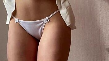 innocent redhead teases stripping lingerie for you