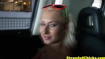blonde hitchhiker teases driver playfully in car