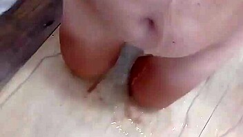 guy unleashes golden shower on her big tits