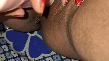 Indian bhabhi rams huge dildo deep in wet hairy pussy moaning