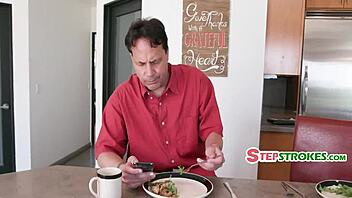 mature woman takes doggystyle pounding through pants hole in kitchen