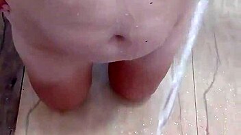 guy unleashes golden shower on her big tits