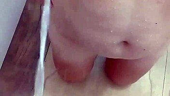 guy unleashes golden shower on her big tits