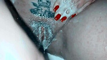 Milf soaps up her shaved pussy nice and close! 🧼🍑